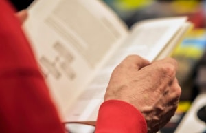Close up of a resident reading a book